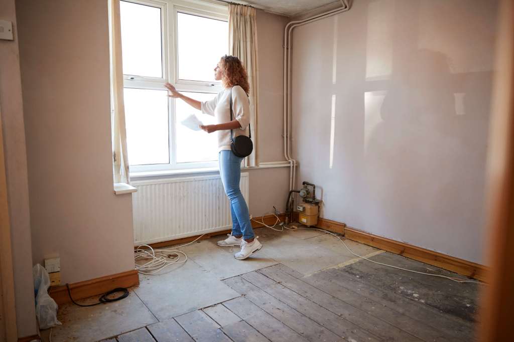 Landlord viewing rental property