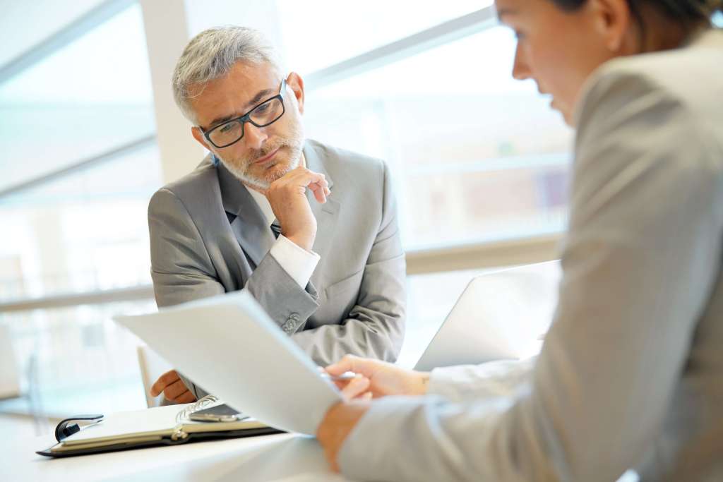 Business people discussing tax