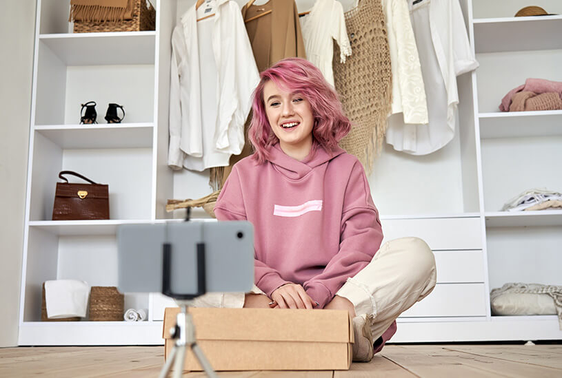 Customer unboxing a product for review