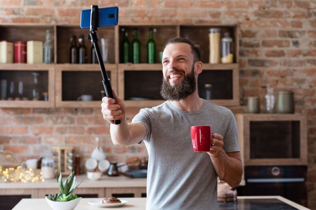 YouTuber recording video at home