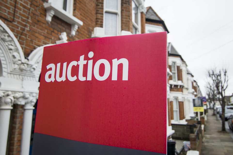 Auction sign outside property