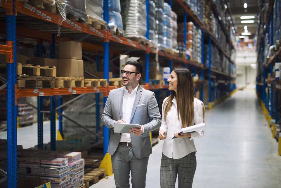 Business people in a warehouse