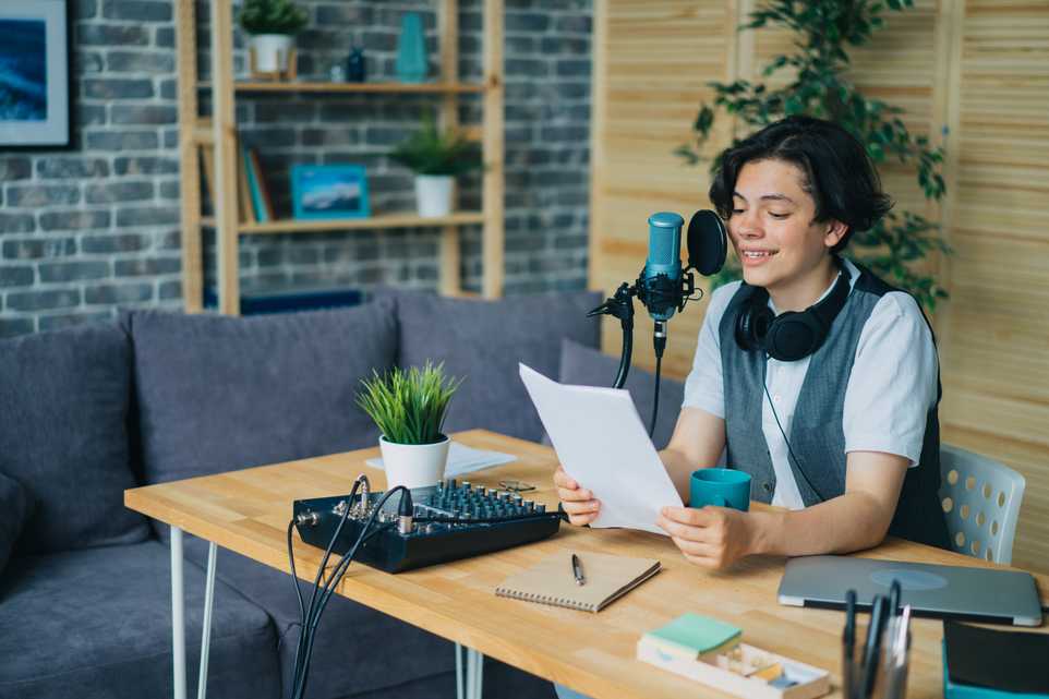 Woman recording a podcast