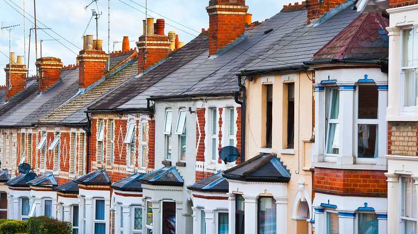 A row of terraced houses in the UK on a sunny day