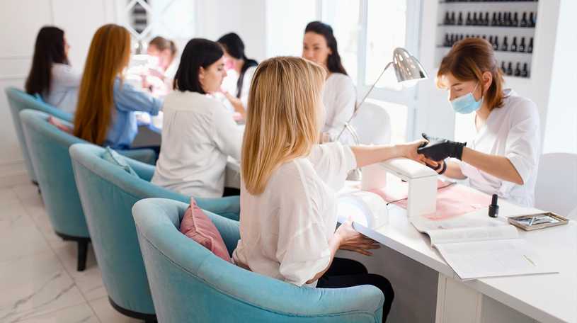 Woman having a manicure in a beauty salon
