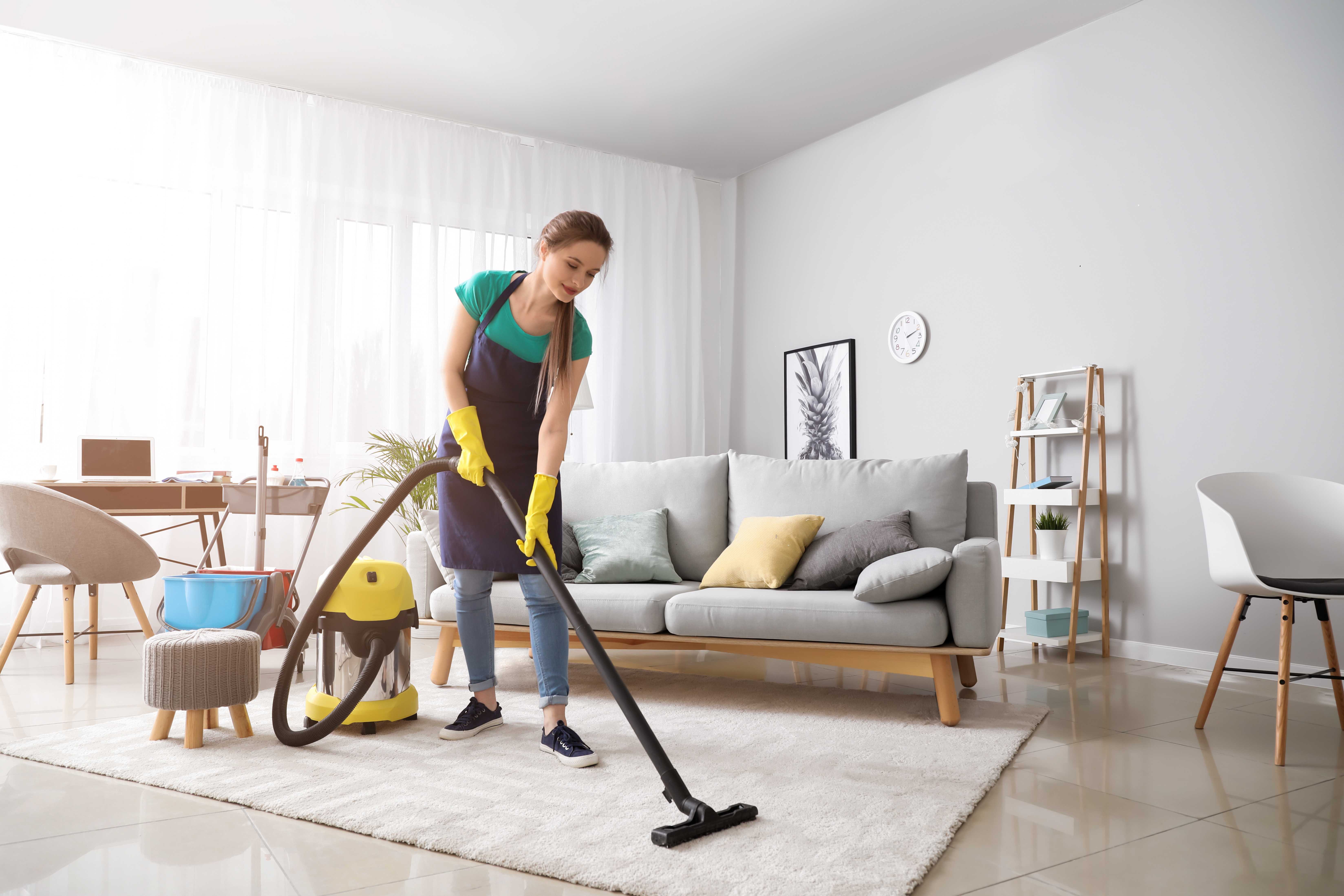 Professional cleaning a rental property