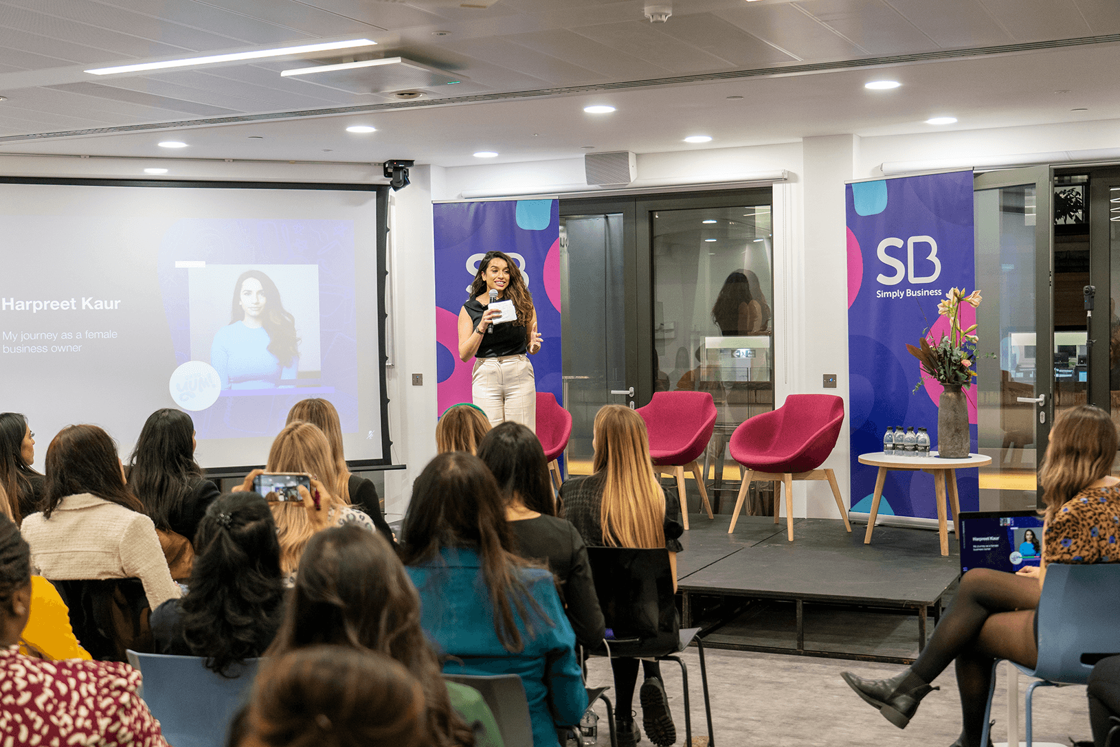 Harpreet Kaur on stage at women in business networking event