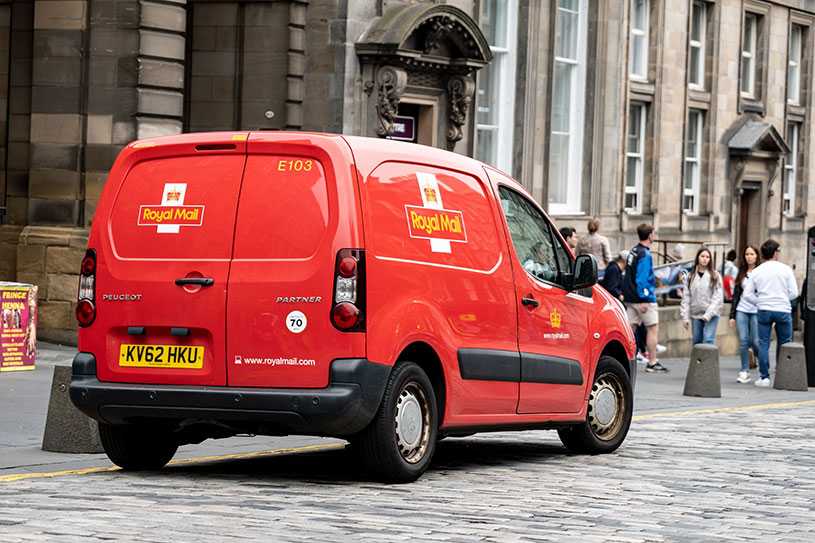 Red Royal Mail van on a UK street