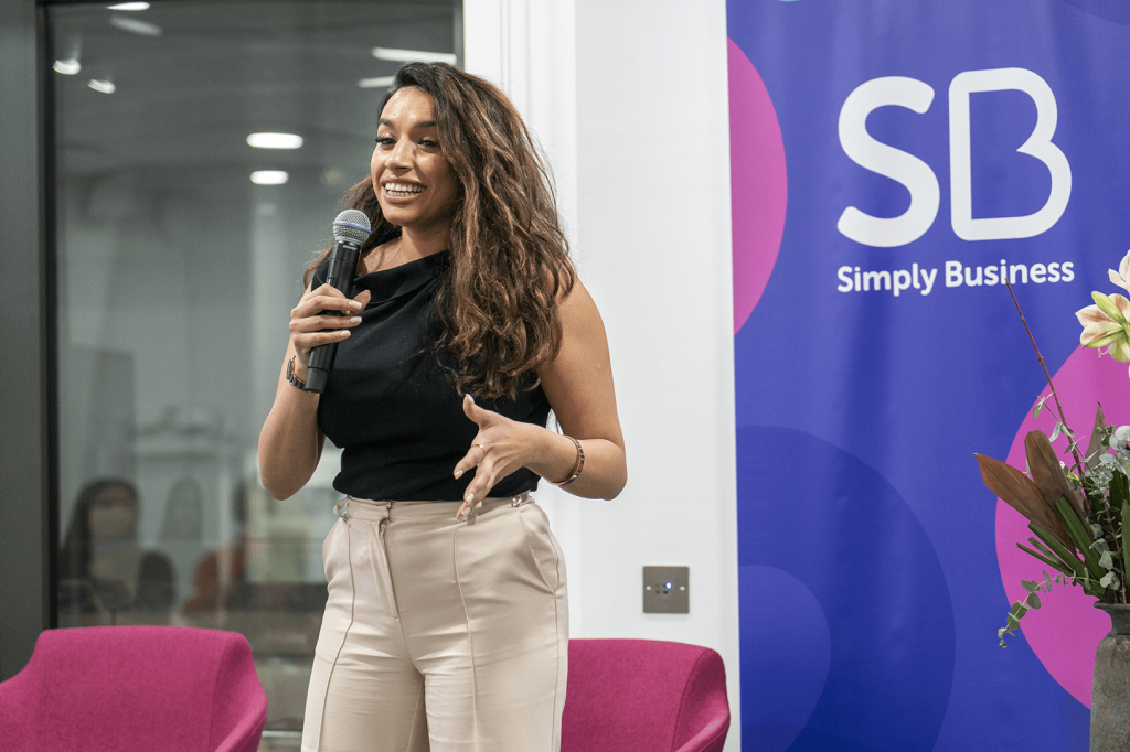 Harpreet Kaur on stage at Empowering Women in Business event