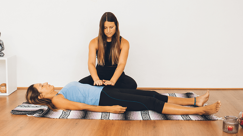 Alternative therapist working on a client