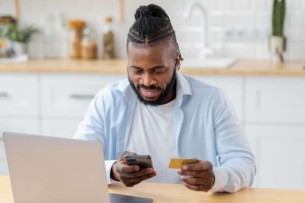Business owner paying by card