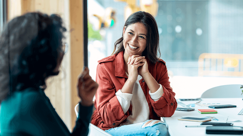 female business coach talking to a client