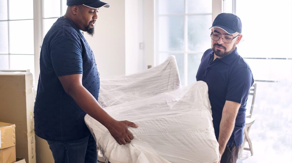 Furniture removal company moving dining room furniture