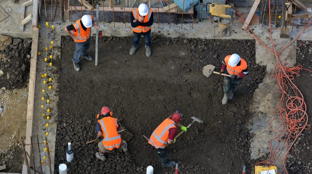 Groundworkers digging some ground