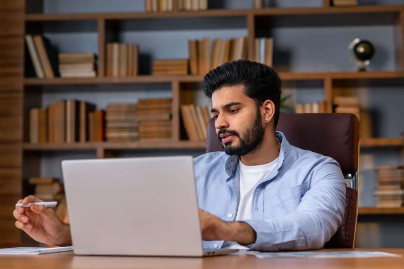 Stressed man at laptop