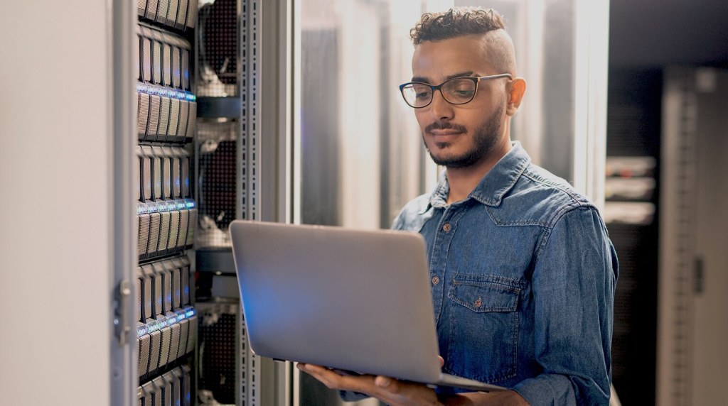 IT contractors working in a server room
