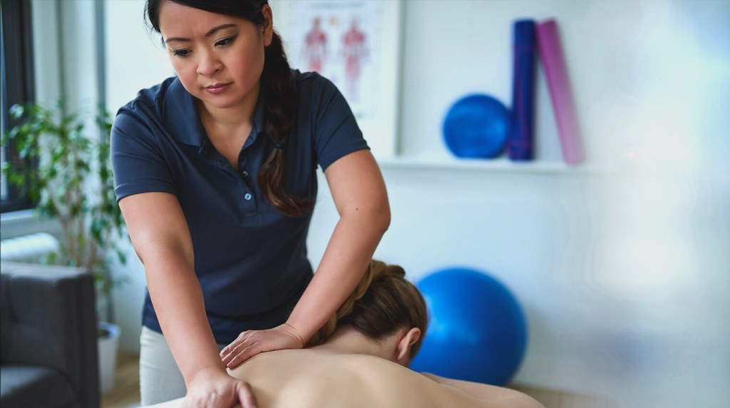 Massage therapist giving a massage