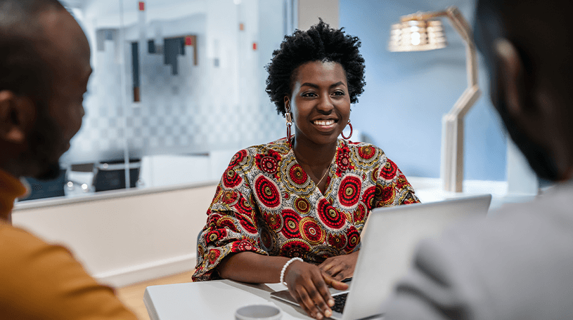 Female advisor working on her laptop