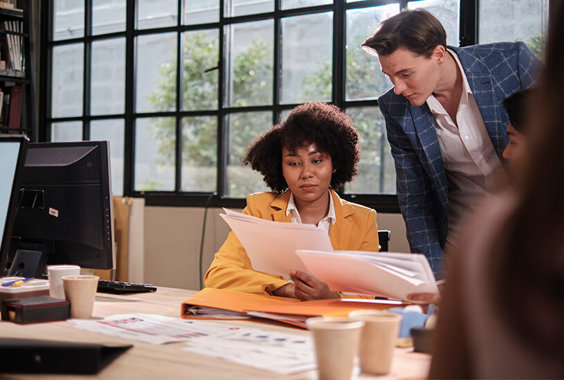 Business partners looking over a partnership agreement
