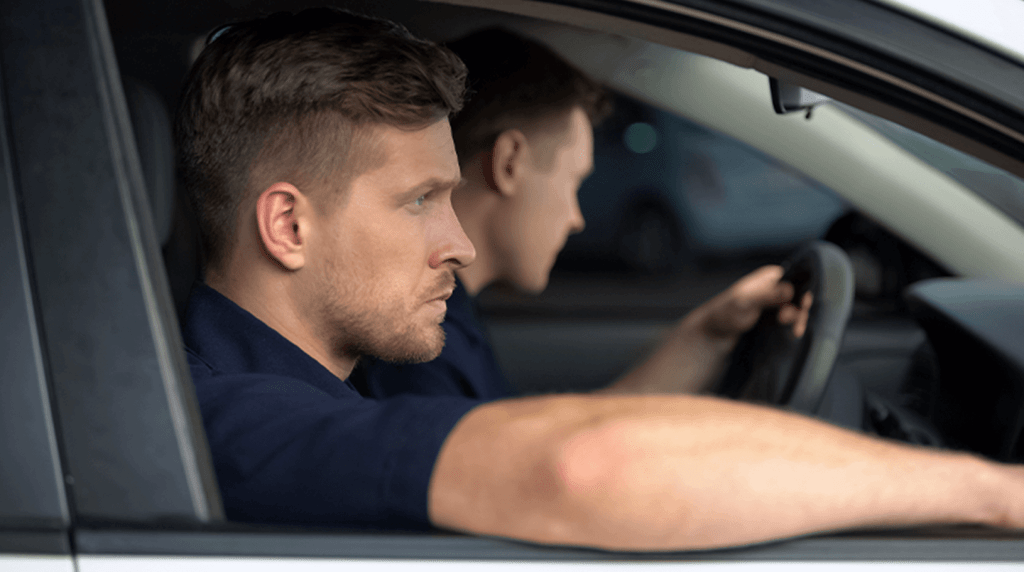 Two private investigators sat in a car