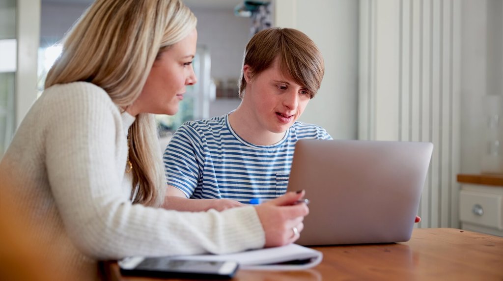 Tutor teaching a student