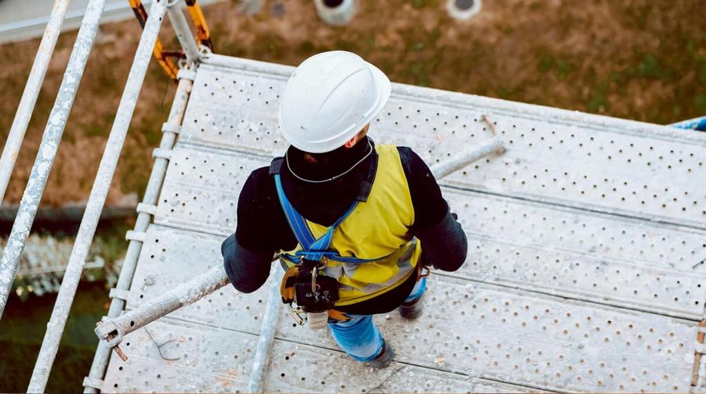 Builder standing on scaffolding