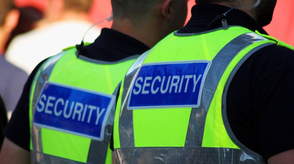 security team at work in security vests
