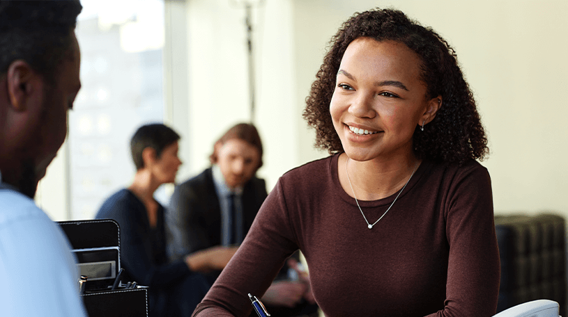 Female solicitor speaking to a client