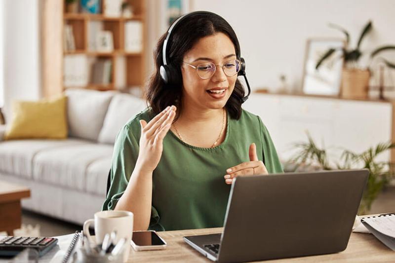 Women in glasses talking on a conference call