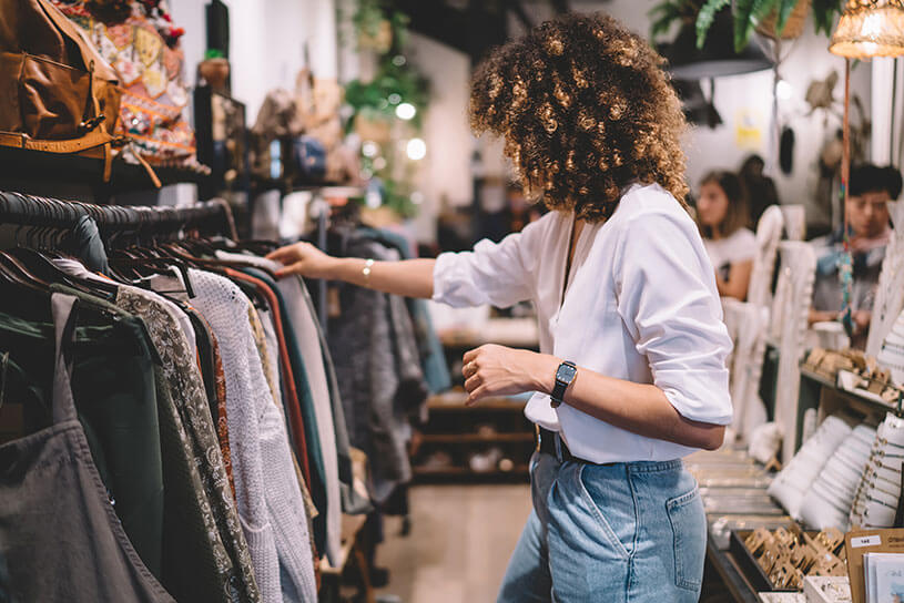Shop owner working on visual merchandising