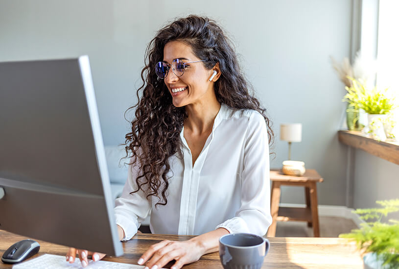 Business owner looking at finance options on a laptop