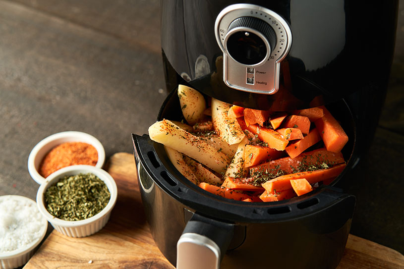 An overfilled air fryer which could be a fire risk for landlords
