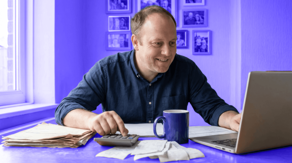 A self-employed business owner completes his Self Assessment tax return