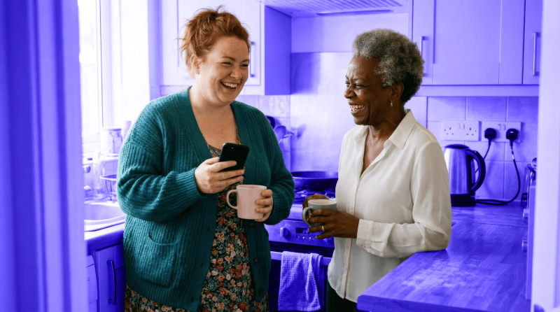A landlord chats with her tenant in her rental property