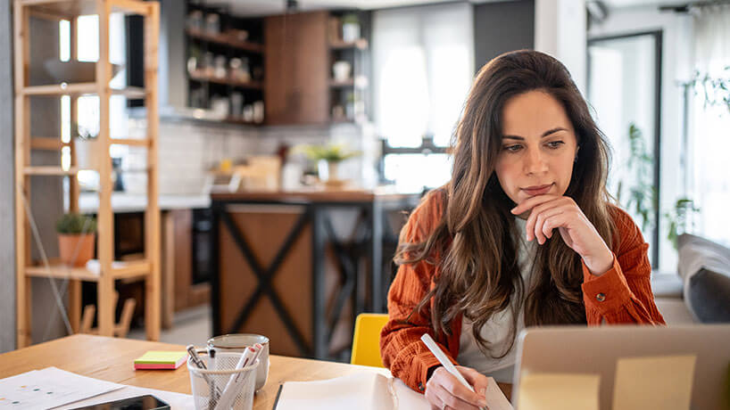 Focused freelancer working on invoices